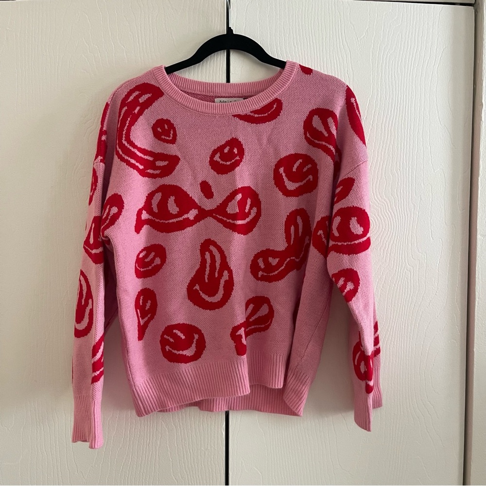 Smiley face sweater